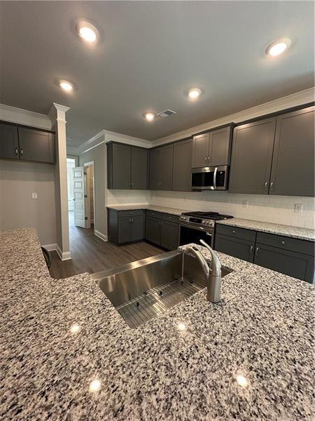 Furnished interior view inside a new home in Mirror Lake at South Harbour, Villa Rica (Image 7).