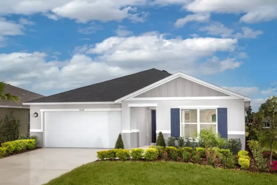 Representative exterior photo of a completed home built from the 2168 by KB Home in Sheeler Park I, Apopka, FL (Image 12). Representative exterior photo of a completed home built from the 2168 by KB Home in Sheeler Park I, Apopka, FL (Image 12).