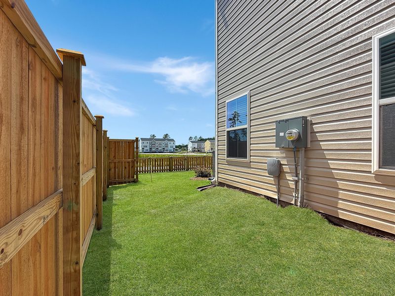 Exterior details and patio area of a home in , Summerville (Image 23).