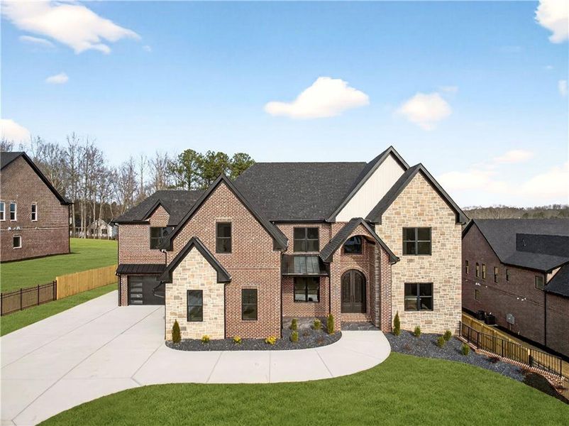 Front exterior of a new home in , Buford, GA, highlighting curb appeal (Image 33). Front exterior of a new home in , Buford, GA, highlighting curb appeal (Image 33).