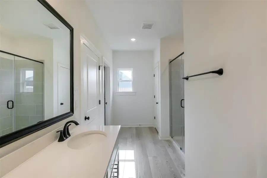 Furnished interior view inside a new home in Aldeana, Bonney (Image 7).