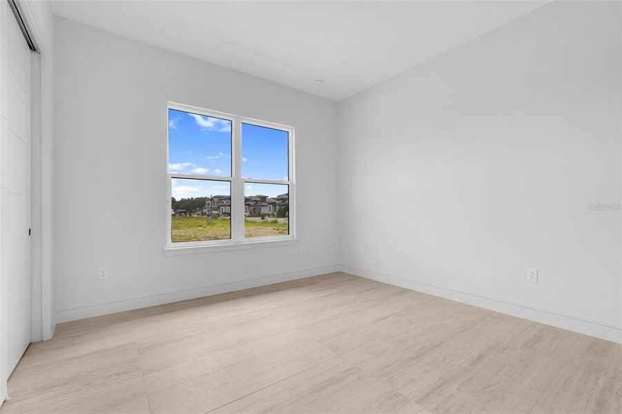 Spacious, unfurnished interior of a new home in Hampton Green at Providence, Davenport (Image 47).
