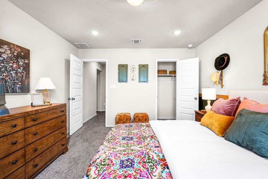 These are the secondary bedrooms of the Hawkins plan and is the model home in Carillon at 13305 Eppright Trace Blvd., Manor, TX. These are the secondary bedrooms of the Hawkins plan and is the model home in Carillon at 13305 Eppright Trace Blvd., Manor, TX.