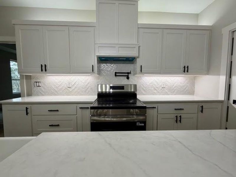 Furnished interior view inside a new home in , Mineola (Image 5).