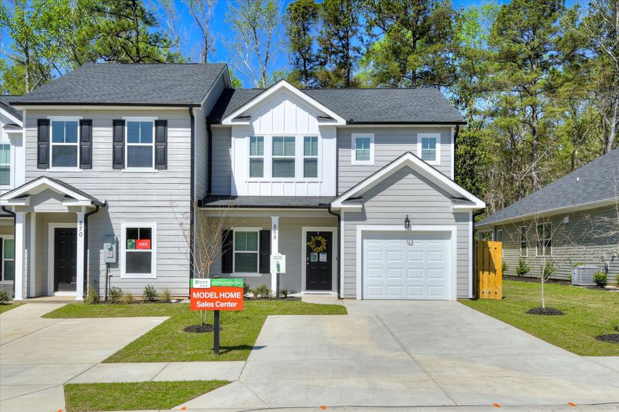 Front exterior of a new home in Forrest Bluff, North Augusta, SC, highlighting curb appeal (Image 13). Front exterior of a new home in Forrest Bluff, North Augusta, SC, highlighting curb appeal (Image 13).