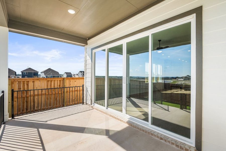 Exterior details and patio area of a home in Arbor Collection at Lariat, Liberty Hill (Image 18). Exterior details and patio area of a home in Arbor Collection at Lariat, Liberty Hill (Image 18).