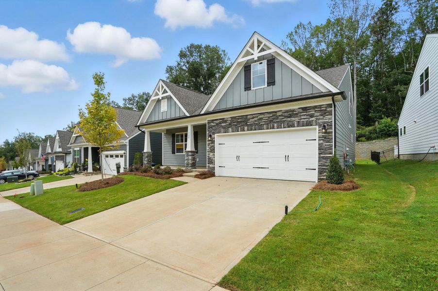Front exterior of a new home in Villas at Prestwick, Mooresville, NC, highlighting curb appeal (Image 25). Front exterior of a new home in Villas at Prestwick, Mooresville, NC, highlighting curb appeal (Image 25).