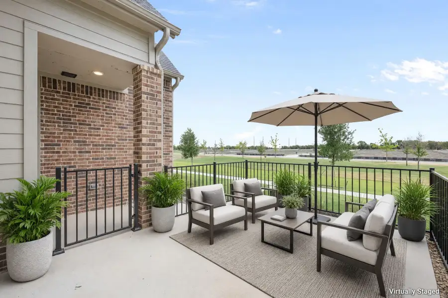 Exterior details and patio area of a home in Cottonwood Creek, Rowlett (Image 4).