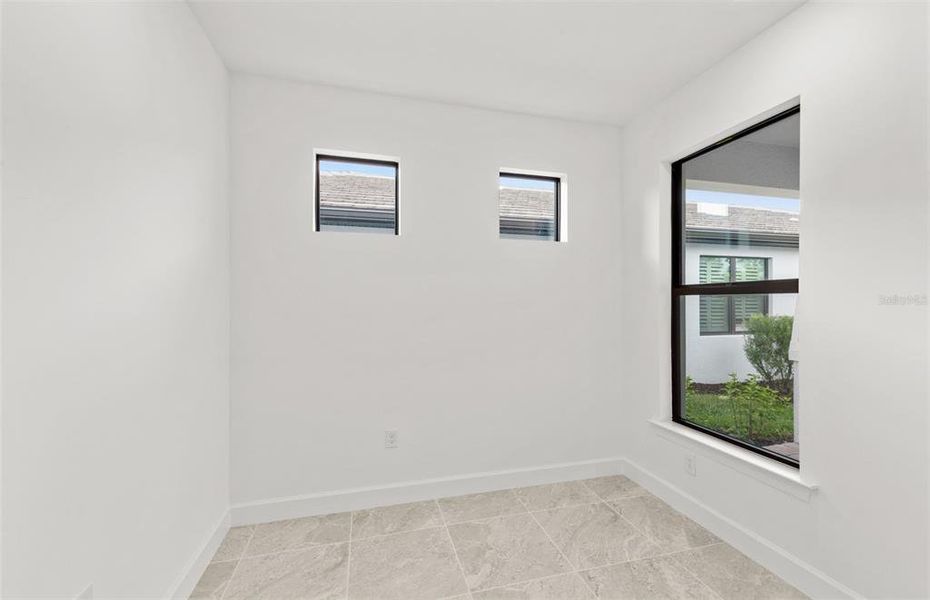 Spacious, unfurnished interior of a new home in Arbor Oaks, North Port (Image 26). Spacious, unfurnished interior of a new home in Arbor Oaks, North Port (Image 26).