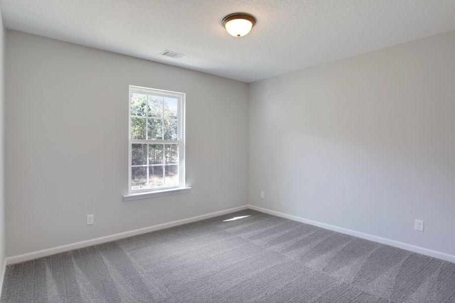 Representative unfurnished interior of a home built from the The Ryon by RTS Homes in Grand Reserve, Hinesville (Image 26).