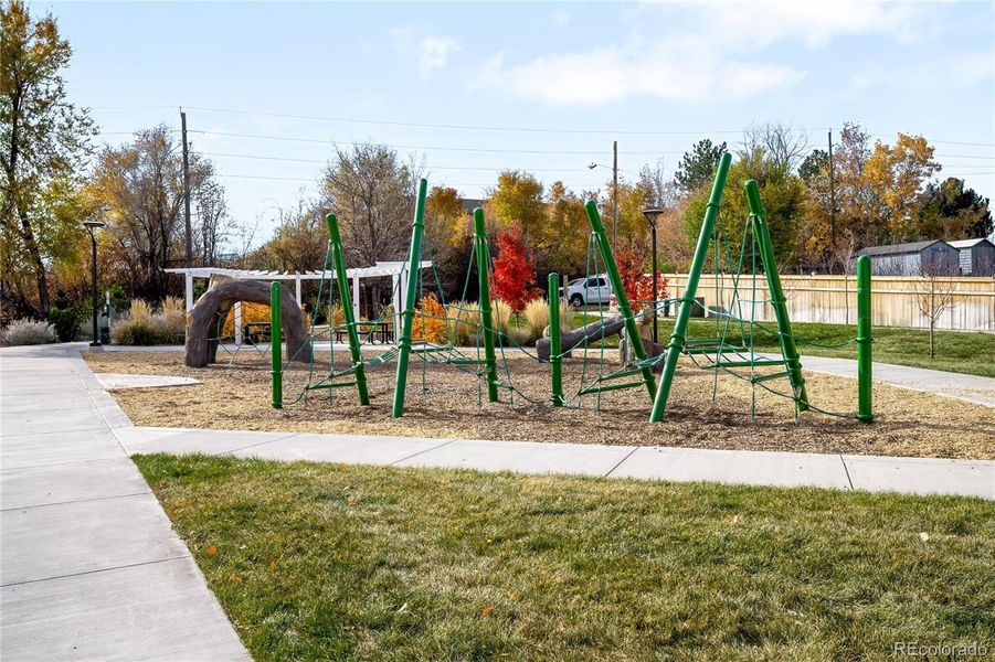 The community features a playground, grills and several paved walkways.