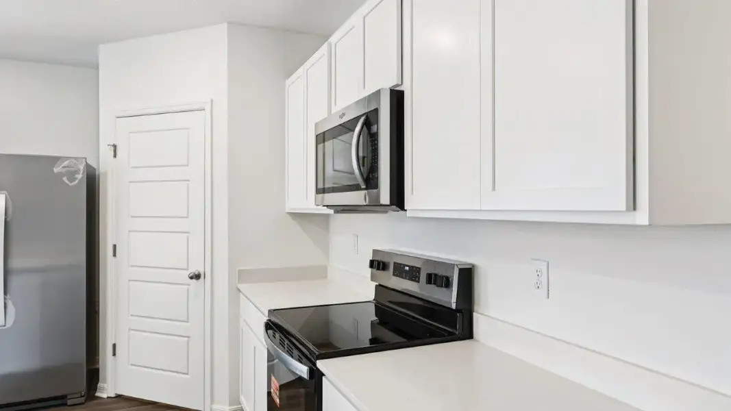 Furnished interior view inside a new home in Cascades, Davenport (Image 8).