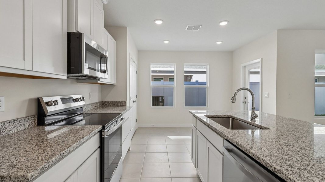 Furnished interior view inside a new home in Cyrene at Harmony, St. Cloud (Image 14).