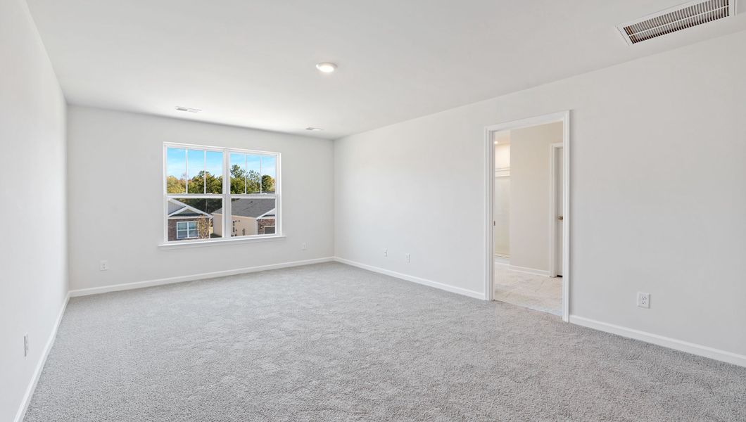 Spacious, unfurnished interior of a new home in Durbin Meadows Traditions, Fountain Inn (Image 26).