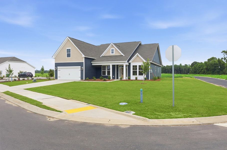 Front exterior of a new home in Edgefield, Loris, SC, highlighting curb appeal (Image 21).