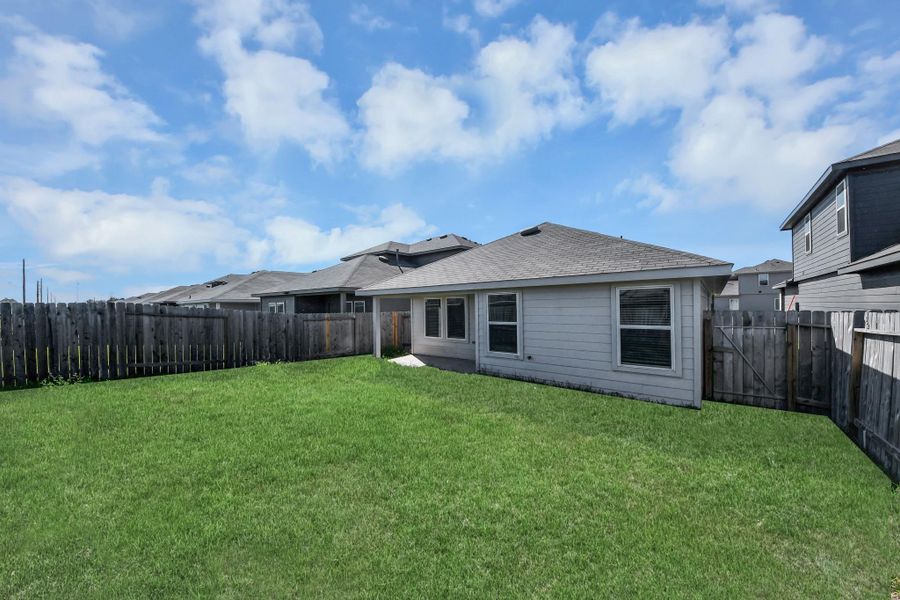 Exterior details and patio area of a home in Legacy Park, Houston (Image 26).