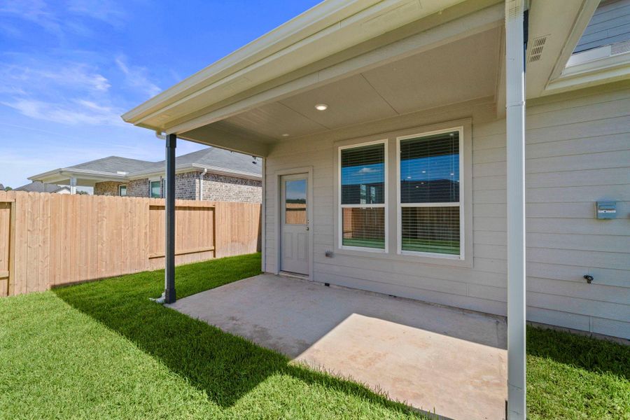 Exterior details and patio area of a home in Montgomery Bend, Montgomery (Image 3).
