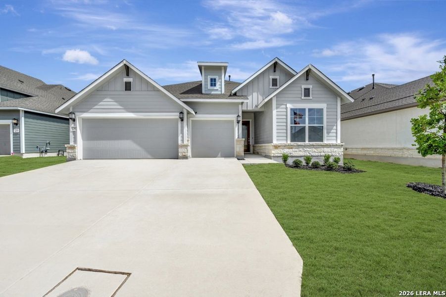 Front exterior of a new home in The Crossvine 55’, Schertz, TX, highlighting curb appeal (Image 18). Front exterior of a new home in The Crossvine 55’, Schertz, TX, highlighting curb appeal (Image 18).