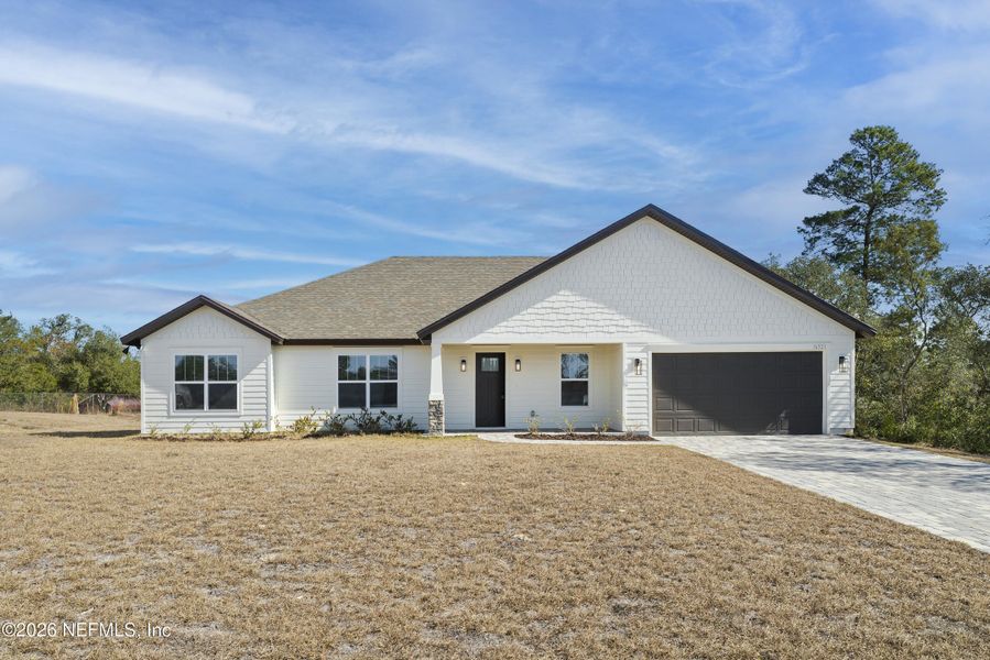 Front exterior of a new home in , Ocala, FL, highlighting curb appeal (Image 26).