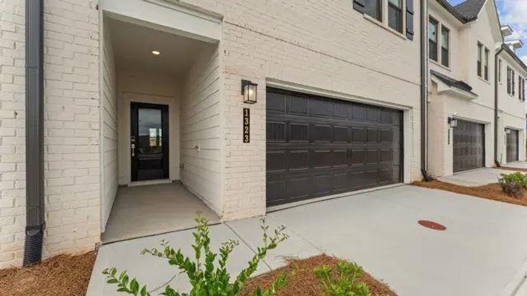 Exterior details and patio area of a home in Magnolia Square, Austell (Image 3).