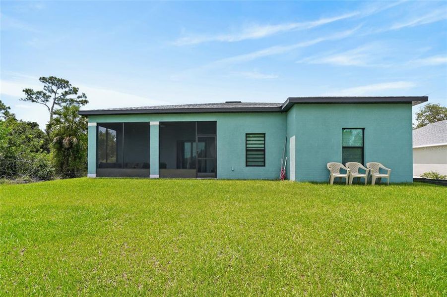 Exterior details and patio area of a home in , Port Charlotte (Image 27).