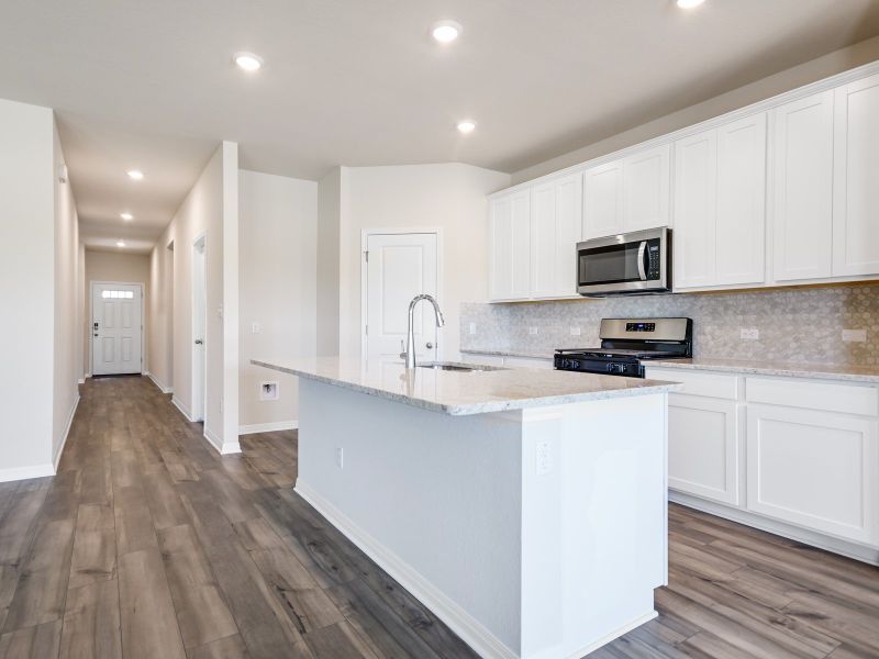 Furnished interior view inside a new home in Butler Farms - Reserve Collection, Liberty Hill (Image 3).