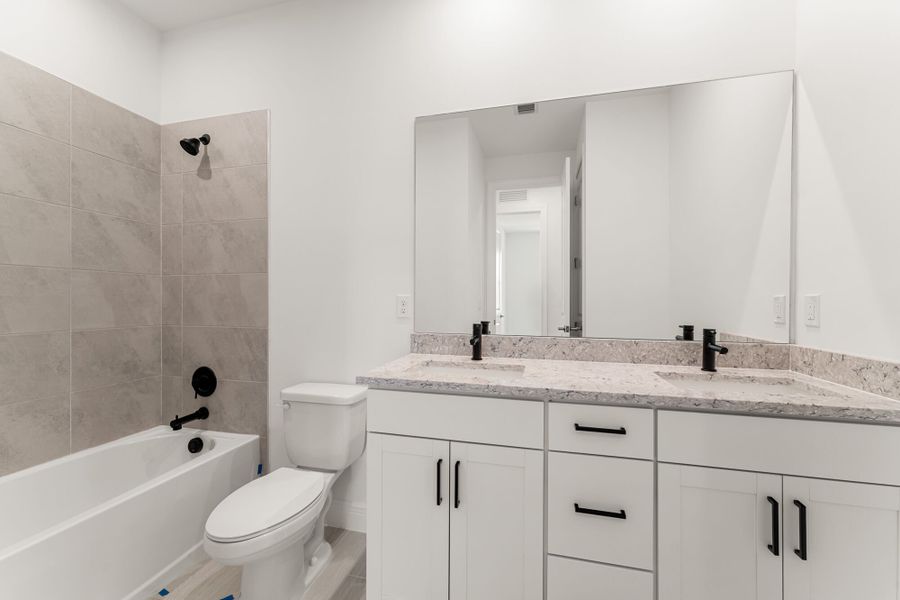 Representative furnished interior of a home built from the Dahlberg by Mattamy Homes in Newfield - Rosette Park, Palm City (Image 13).