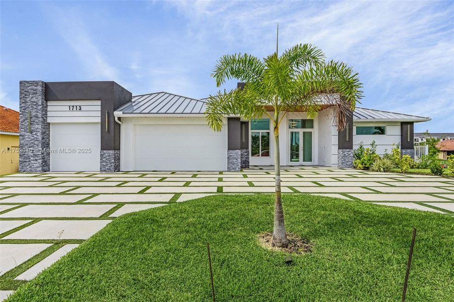 Front exterior of a new home in , Cape Coral, FL, highlighting curb appeal (Image 19).