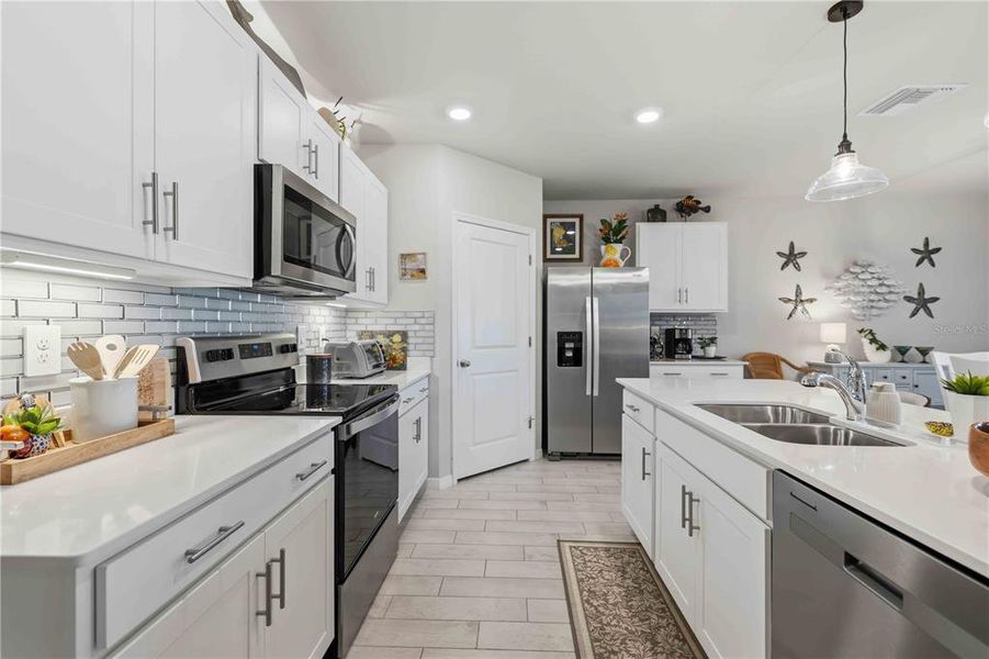 Furnished interior view inside a new home in Burnt Store Village, Punta Gorda (Image 14).