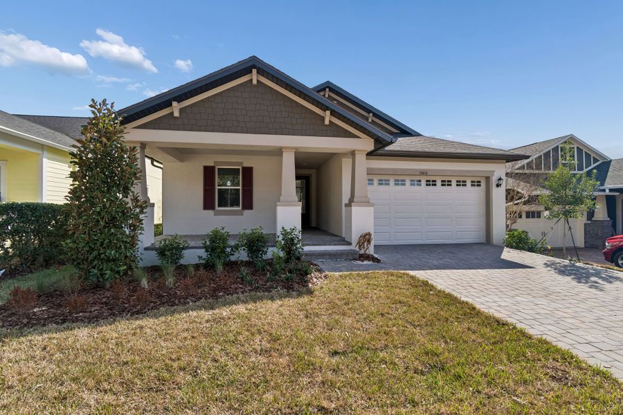 Front exterior of a new home in Southern Hills Plantation, Brooksville, FL, highlighting curb appeal (Image 25).