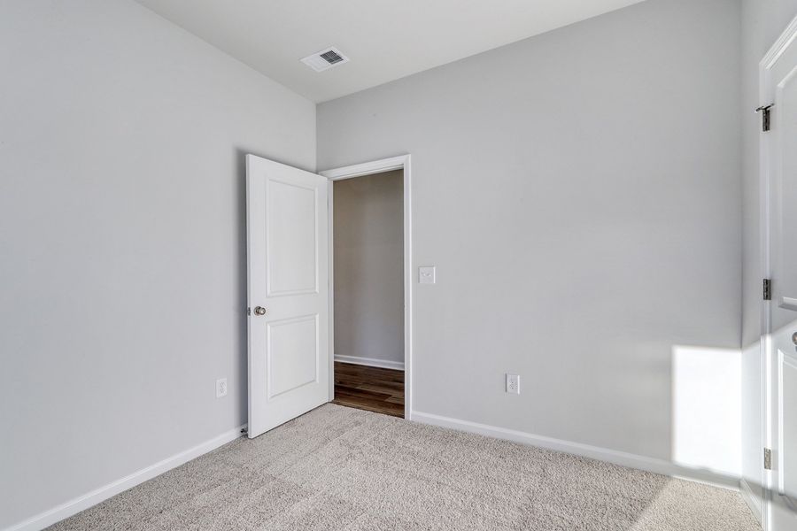 Spacious, unfurnished interior of a new home in Hainer Place, Conway (Image 26).