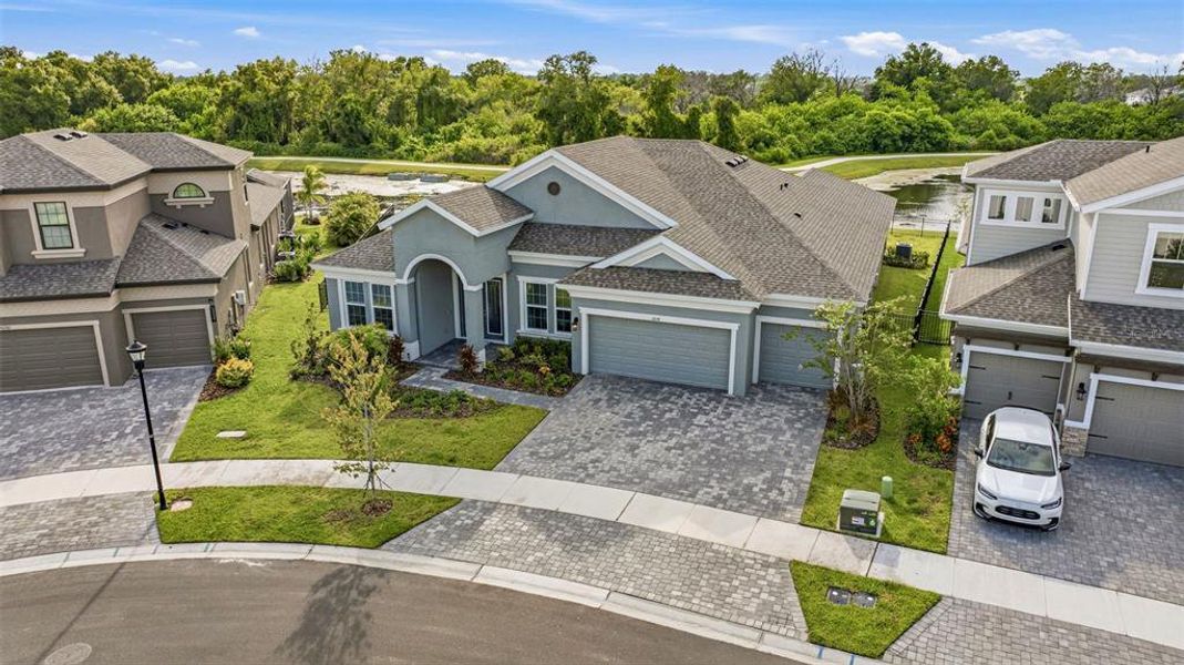 Front exterior of a new home in Waterset, Apollo Beach, FL, highlighting curb appeal (Image 23). Front exterior of a new home in Waterset, Apollo Beach, FL, highlighting curb appeal (Image 23).