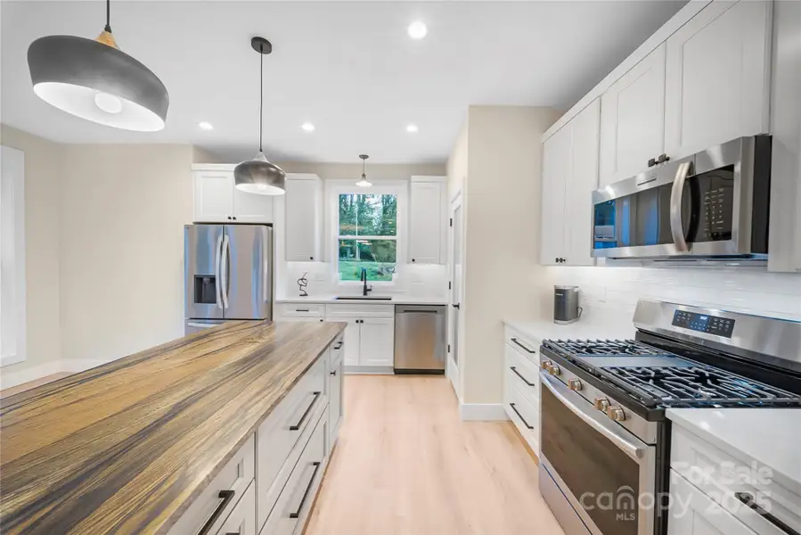 Furnished interior view inside a new home in , Asheville (Image 13).