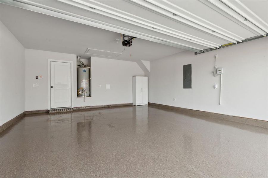 The owners added this beautiful epoxy flooring in the garage.