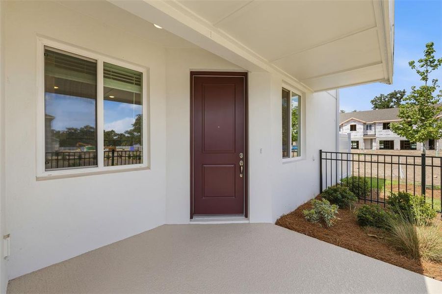 Exterior details and patio area of a home in River Oaks Townhomes, Riverview (Image 3). Exterior details and patio area of a home in River Oaks Townhomes, Riverview (Image 3).