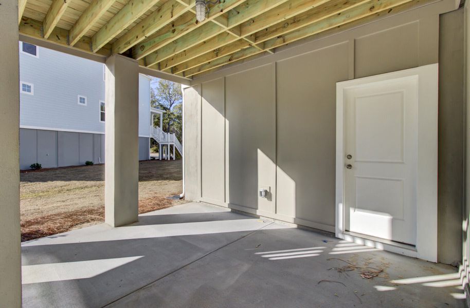 Exterior details and patio area of a home in Indigo Grove Single Family Homes, Johns Island (Image 26).