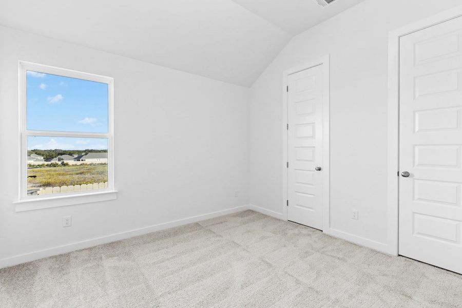 Spacious, unfurnished interior of a new home in The Colony, Bastrop (Image 27).