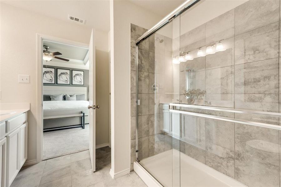 Oversized shower *Photos of furnished model. Not actual home. Representative of floor plan. Some options and features may vary.