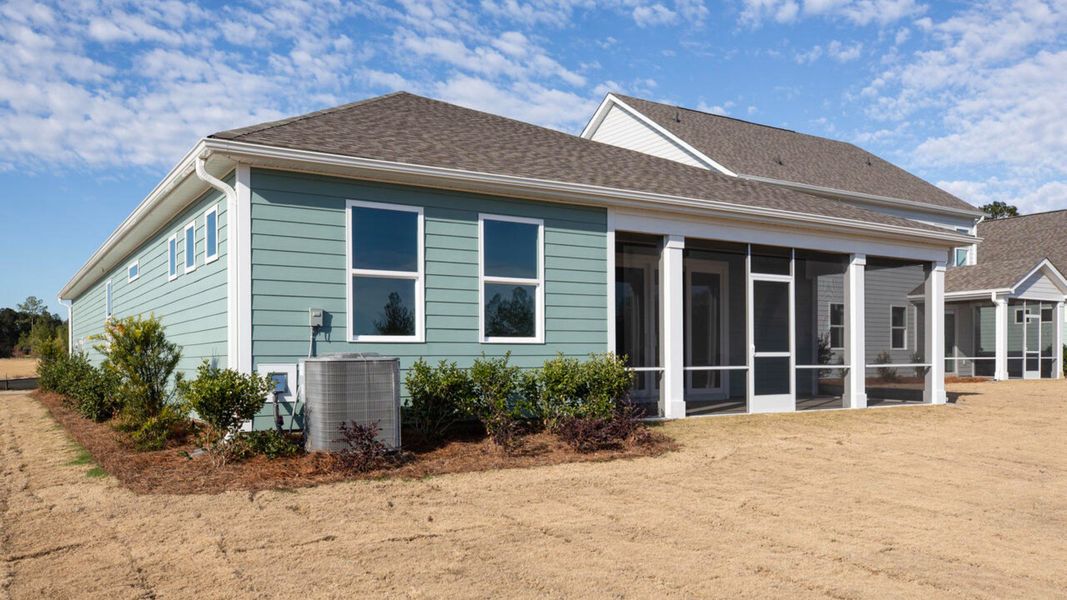 Exterior details and patio area of a home in The Haven at Indigo Preserve, Leland (Image 17). Exterior details and patio area of a home in The Haven at Indigo Preserve, Leland (Image 17).