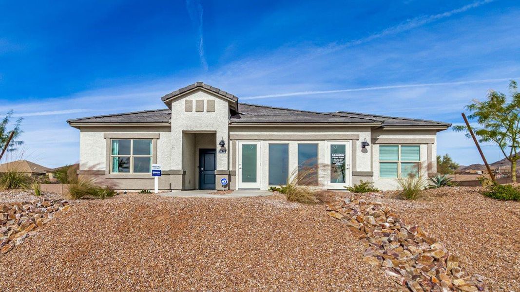 Representative exterior photo of a completed home built from the Kingston - Plan H40K by D.R. Horton in Tortolita Trails, Marana, AZ (Image 1).
