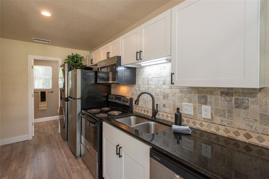 Furnished interior view inside a new home in , Log Cabin (Image 13).