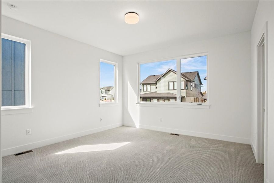 Spacious, unfurnished interior of a new home in West Grange, Longmont (Image 16).