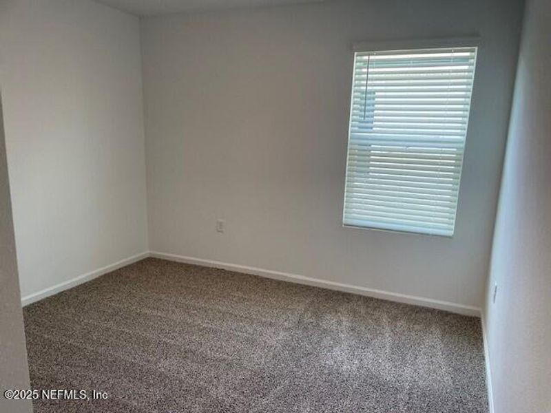 Spacious, unfurnished interior of a new home in The Arbors, Jacksonville (Image 33).