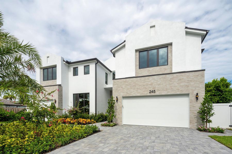 Front exterior of a new home in , West Palm Beach, FL, highlighting curb appeal (Image 22).