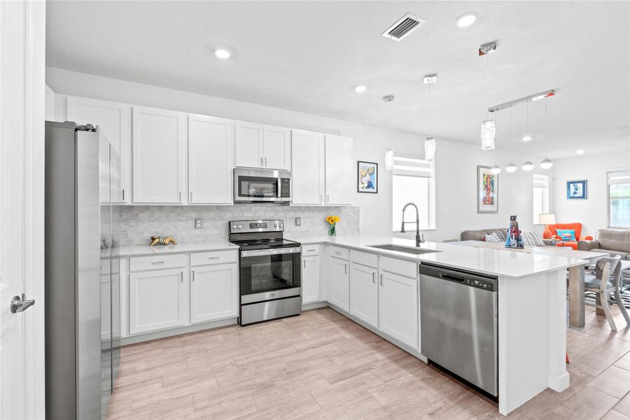 Furnished interior view inside a new home in Delray Trails: The Woods, Delray Beach (Image 24). Furnished interior view inside a new home in Delray Trails: The Woods, Delray Beach (Image 24).