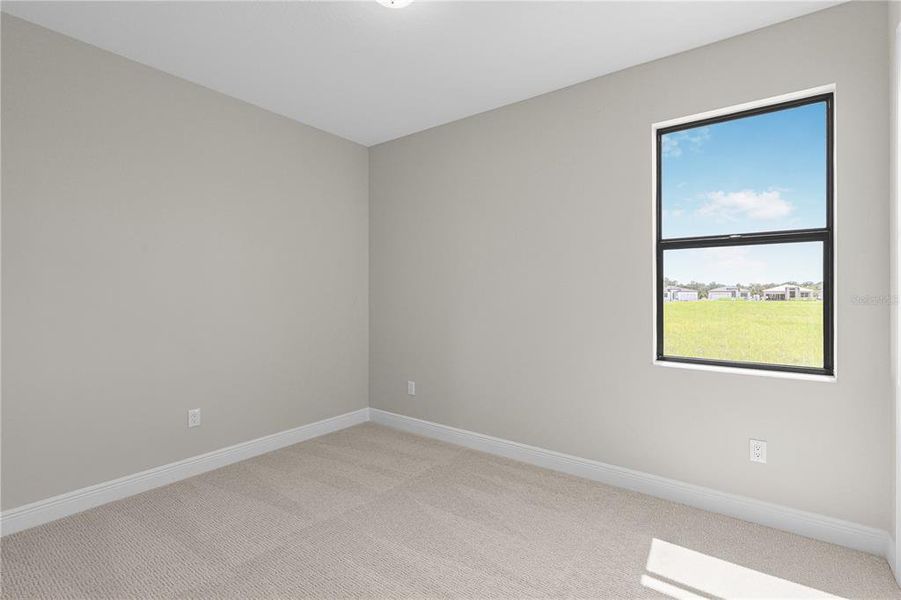Spacious, unfurnished interior of a new home in Woodland Preserve, Parrish (Image 25).