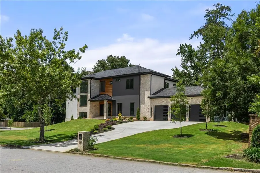 Front exterior of a new home in , Sandy Springs, GA, highlighting curb appeal (Image 30). Front exterior of a new home in , Sandy Springs, GA, highlighting curb appeal (Image 30).