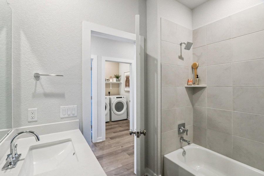 Furnished interior view inside a new home in Stallion Run, Buda (Image 6).