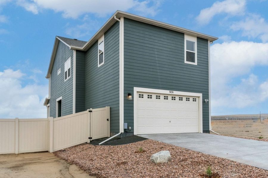Front exterior of a new home in The Trails at Aspen Ridge – Altitude Collection, Colorado Springs, CO, highlighting curb appeal (Image 29). Front exterior of a new home in The Trails at Aspen Ridge – Altitude Collection, Colorado Springs, CO, highlighting curb appeal (Image 29).