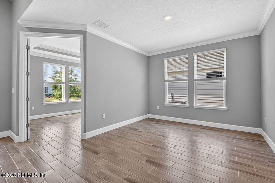 Spacious, unfurnished interior of a new home in Colbert Landings, Palm Coast (Image 29).